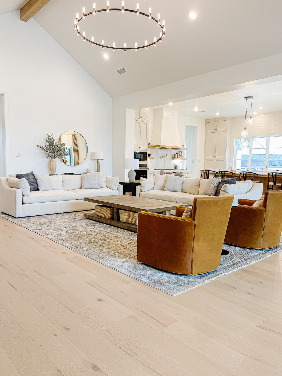 Living room and hardwood flooring by Rise Reno